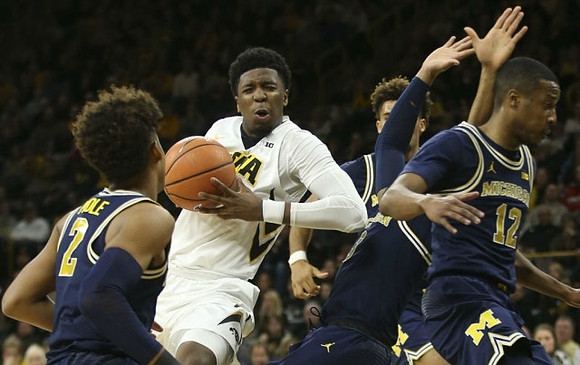 Jordan Poole (2), Isaiah Livers (4), and Muhammad-Ali Abdur-Rahkman (12)
