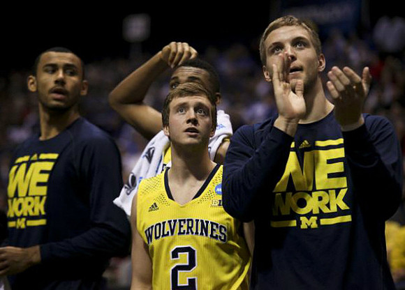 Jon Horford (15), Spike Albrecht (2), Zak Irvin (21), and Mark Donnal (34)