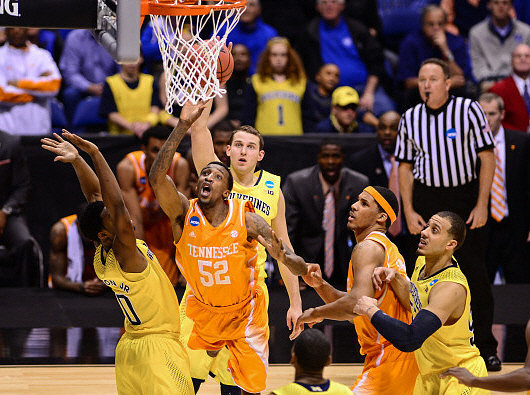 Derrick Walton Jr. (10), Nik Stauskas (11), Jordan Morgan (52)
