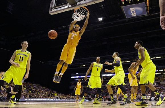 Nik Stauskas (11), Glenn Robinson III (1), Jordan Morgan (52), and Derrick Walton Jr. (10)