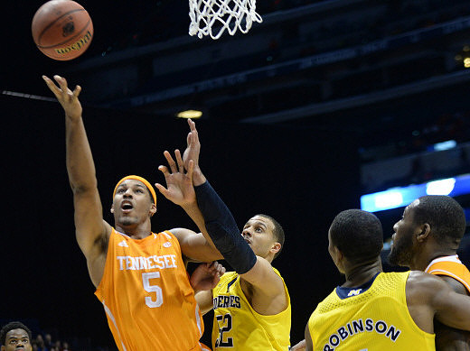 Jordan Morgan (52) and Glenn Robinson III (1)