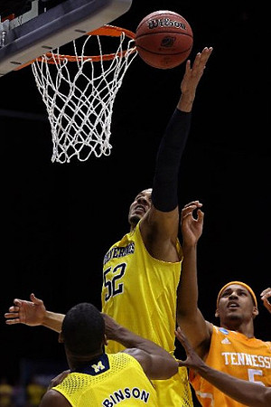 Glenn Robinson III (1) and Jordan Morgan (52)
