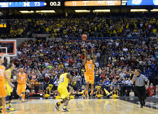 Nik Stauskas (11) and Caris LeVert (23)