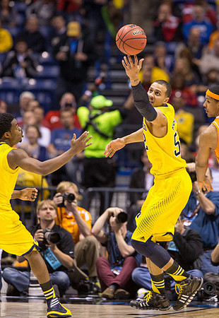 Derrick Walton Jr. (10) and Jordan Morgan (52)