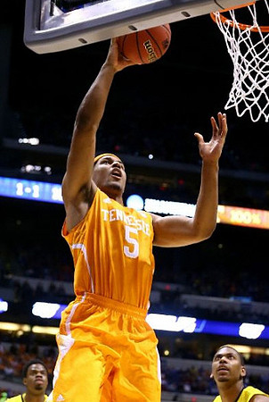 Derrick Walton Jr. (10) and Glenn Robinson III (1)