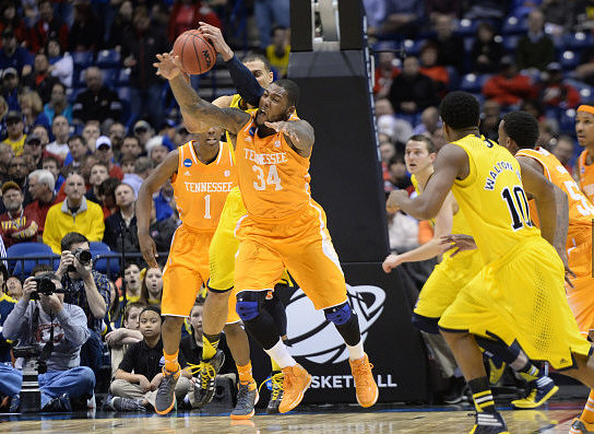 Nik Stauskas (11) and Derrick Walton Jr. (10)