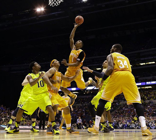 Derrick Walton Jr. (10) and Jordan Morgan (52)