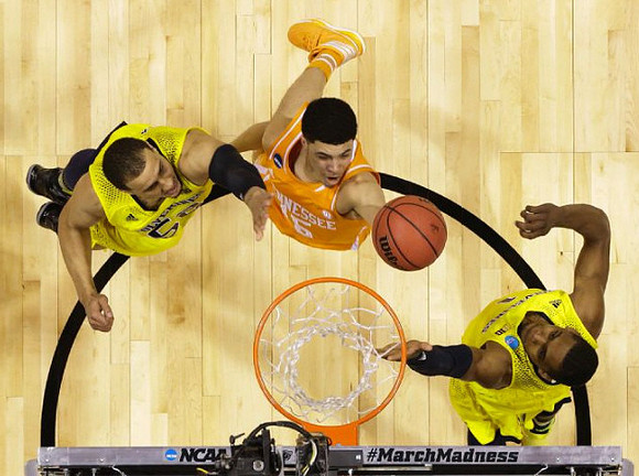 Jordan Morgan (52) and Glenn Robinson III (1)