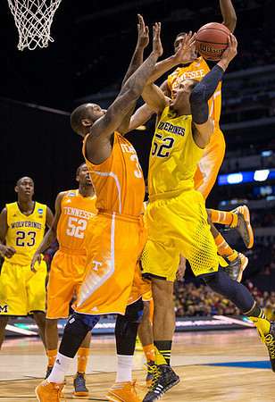 Caris LeVert (23) and Jordan Morgan (52)