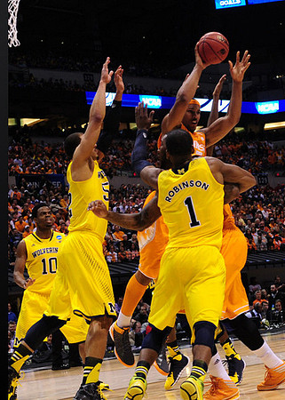 Derrick Walton Jr. (10), Jordan Morgan (52), and Glenn Robinson III (1)