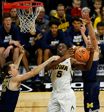 Duncan Robinson (22) and Moritz Wagner (13)
