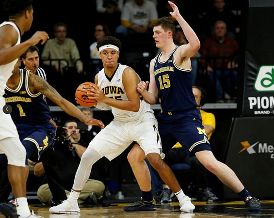 Charles Matthews (1) and Jon Teske (15)
