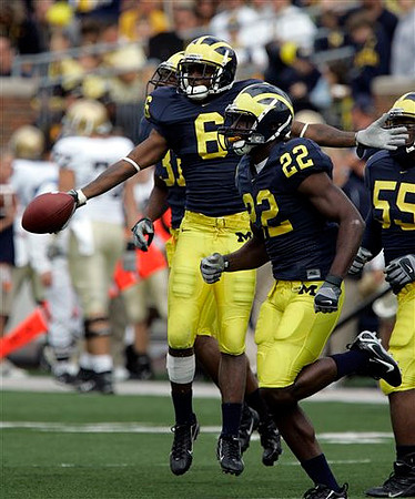 Donovan Warren, Jamar Adams, and Brandon Graham
