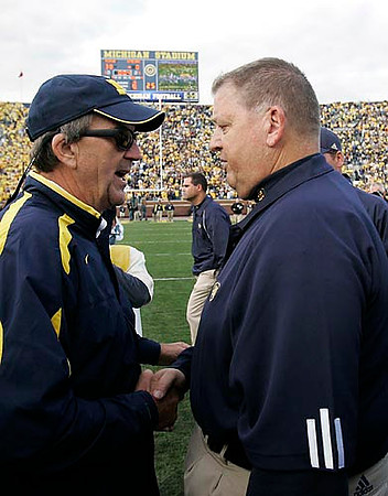 Lloyd Carr and Charlie Weis