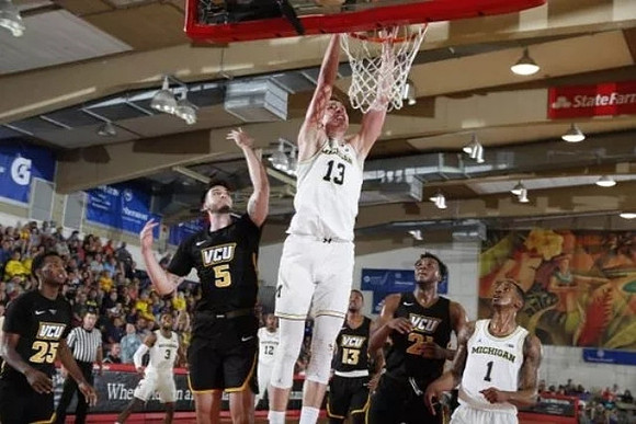 Zavier Simpson (3), Moritz Wagner (13), and Charles Matthews (1)