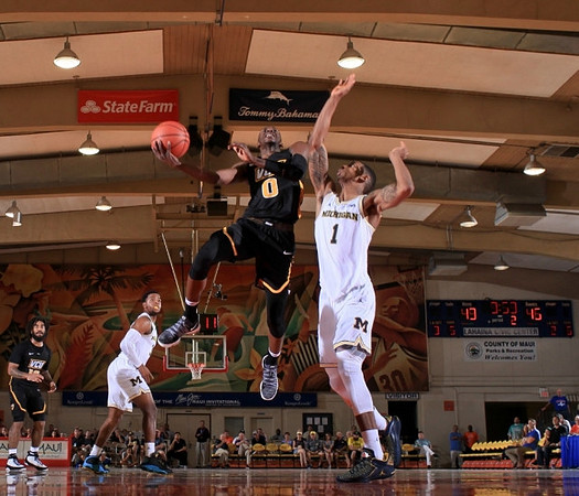 Charles Matthews (1) and Zavier Simpson (3)