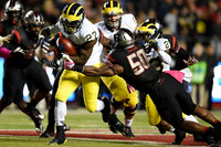 Derrick Green (27), Mason Cole (52), and Dennis Norfleet (23)