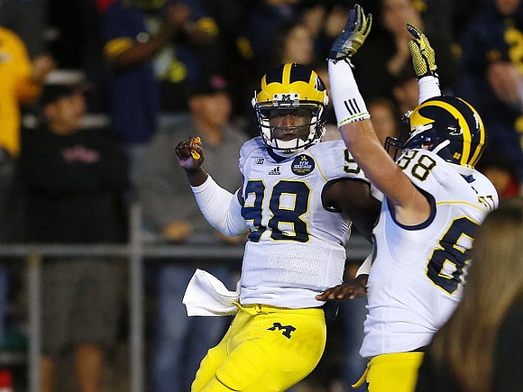 Devin Gardner (98) and Jake Butt (88)