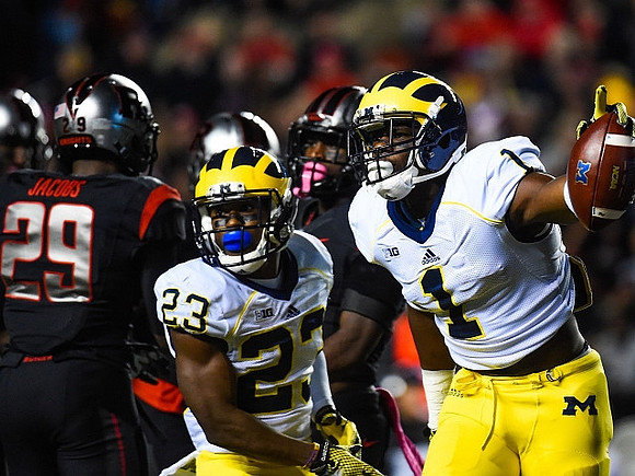 Dennis Norfleet (23) and Devin Funchess (1)