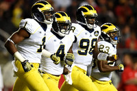 Devin Funchess (1), De'Veon Smith (4), Devin Gardner (98), and Dennis Norfleet (23)