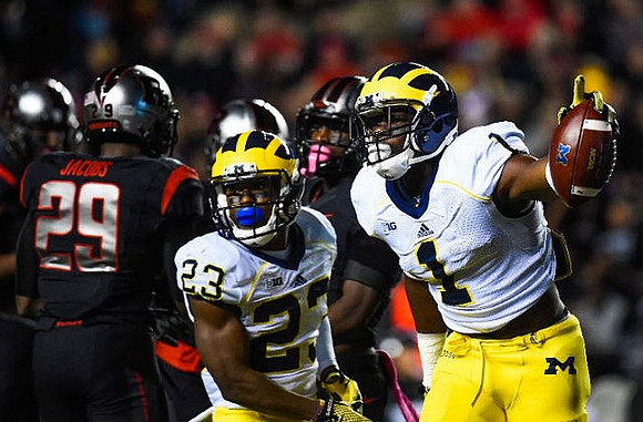 Dennis Norfleet (23) and Devin Funchess (1)