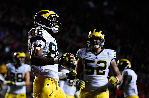 Jehu Chesson (86) and Mason Cole (52)