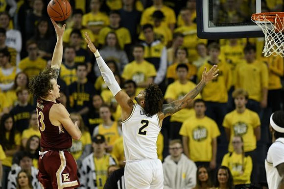 Isaiah Livers (2) and Zavier Simpson (3)