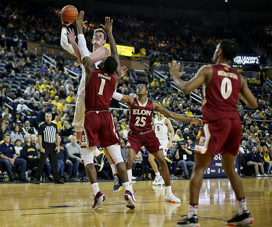 Jon Teske (15) and Adrien Nunez (5)