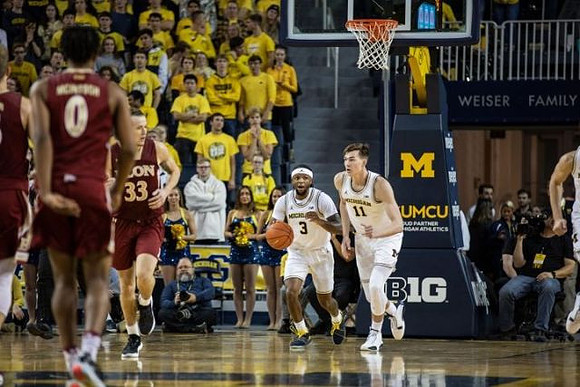 Zavier Simpson (3) and Colin Castleton (11)
