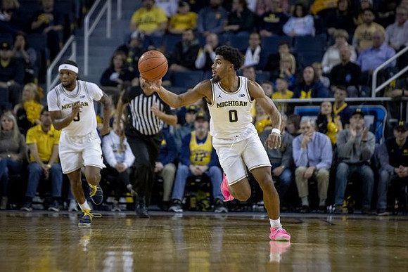 Zavier Simpson (3) and David DeJulius (0)