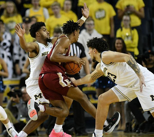 David DeJulius (0) and Brandon Johns Jr. (23)