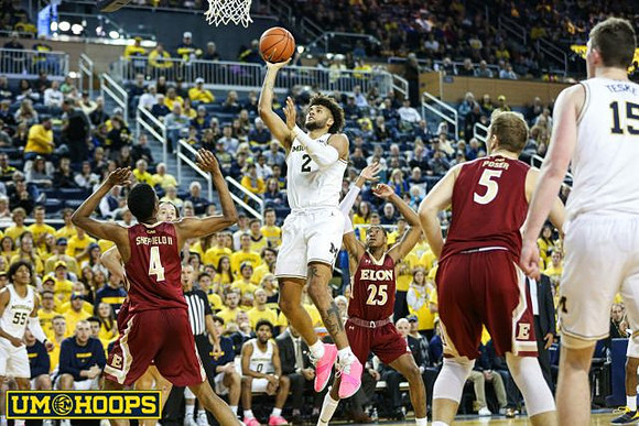 Eli Brooks (55), Isaiah Livers (2), and Jon Teske (15)