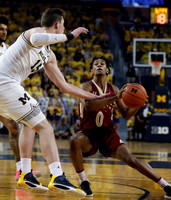 Isaiah Livers (2) and Jon Teske (15)