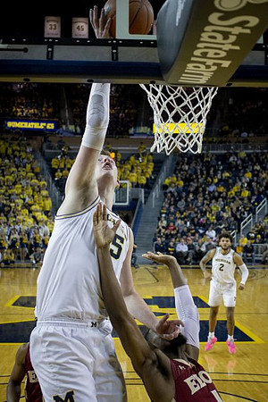 Jon Teske (15) and Isaiah Livers (2)