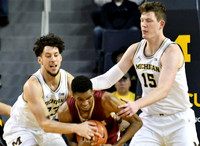 Brandon Johns Jr. (23) and Jon Teske (15)