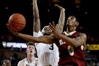 Jon Teske (15) and Zavier Simpson (3)