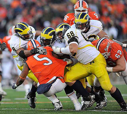 Jonas Mouton (8), Brandon Graham (55), Mike Martin (68), and Ryan Van Bergen (53)