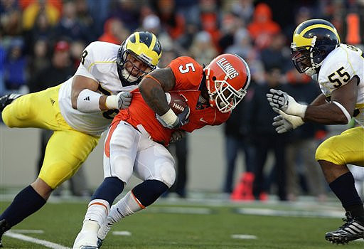 Mike Martin (68) and Brandon Graham (55)