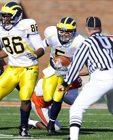 Kevin Koger (86) and Tate Forcier (5)