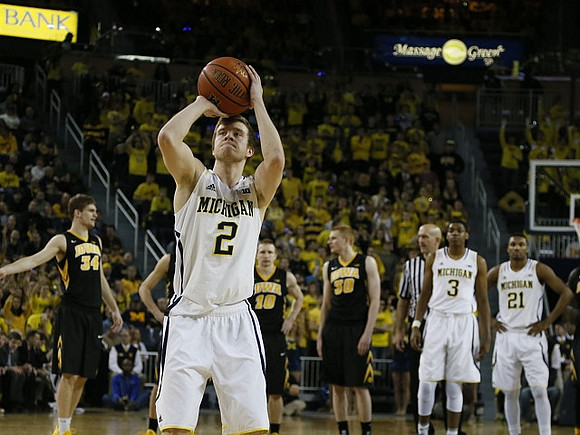 Spike Albrecht (2), Kameron Chatman (3), and Zak Irvin (21)