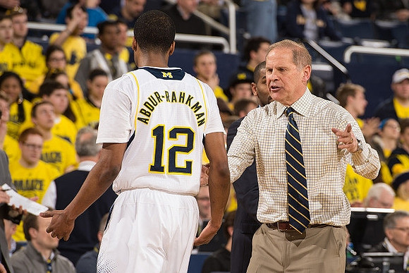 Muhammad-Ali Abdur-Rahkman (12) and John Beilein