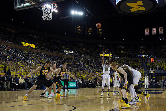 Muhammad-Ali Abdur-Rahkman (12), Spike Albrecht (2), Zak Irvin (21), and Aubrey Dawkins (24)