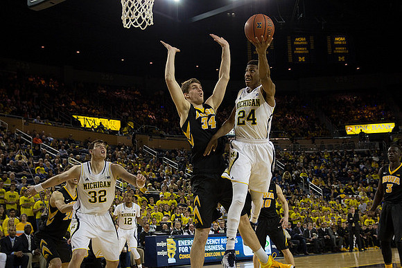 Ricky Doyle (32), Muhammad-Ali Abdur-Rahkman (12), and Aubrey Dawkins (24)