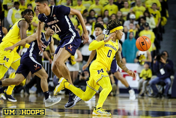 Tarris Reed Jr. (32) and Dug McDaniel (0)