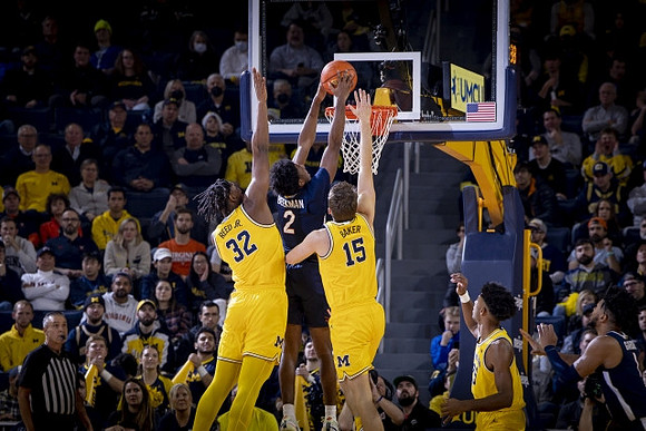Tarris Reed Jr. (32), Joey Baker (15), and Jace Howard (25)