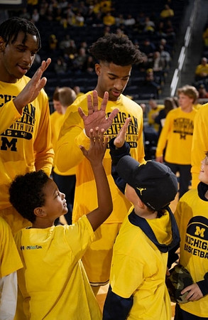 Tarris Reed Jr. (32) and Jace Howard (25)