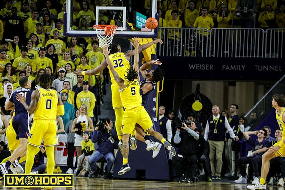 Dug McDaniel (0), Tarris Reed Jr. (32), and Terrance Williams II (5)