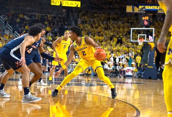 Terrance Williams II (5) and Kobe Bufkin (2)