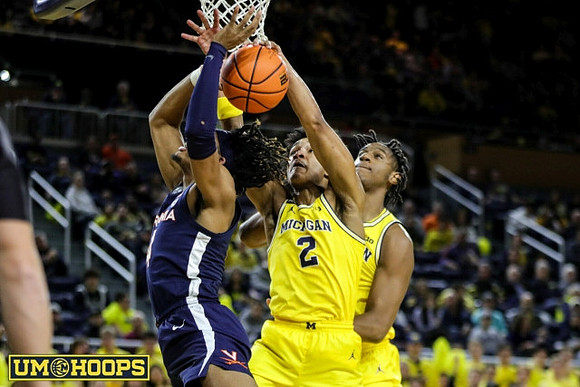 Kobe Bufkin (2) and Tarris Reed Jr. (32)