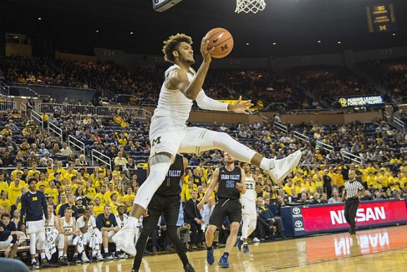 Isaiah Livers (4) and Ibi Watson (23)